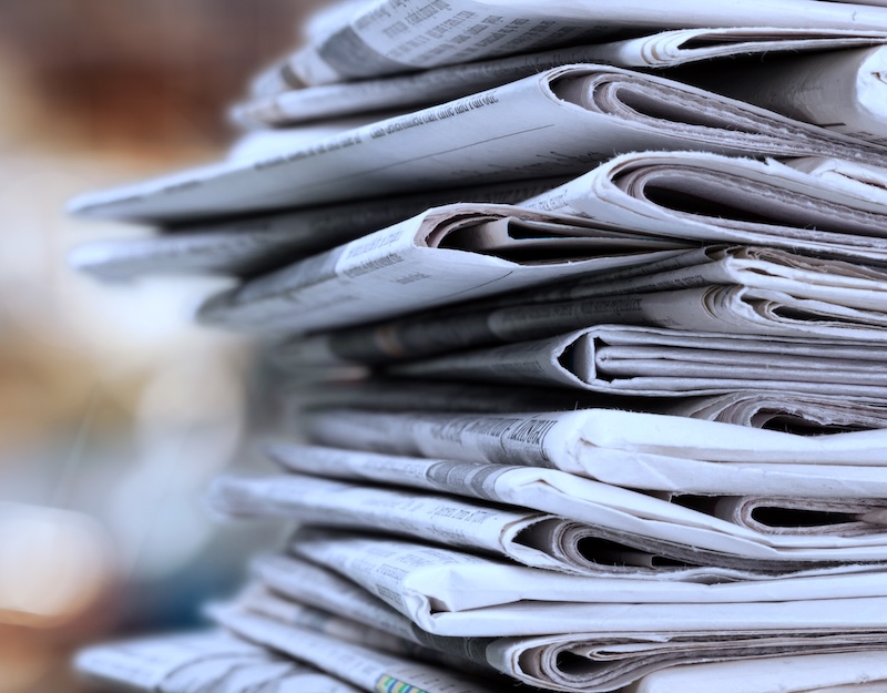 a stack of newspapers
